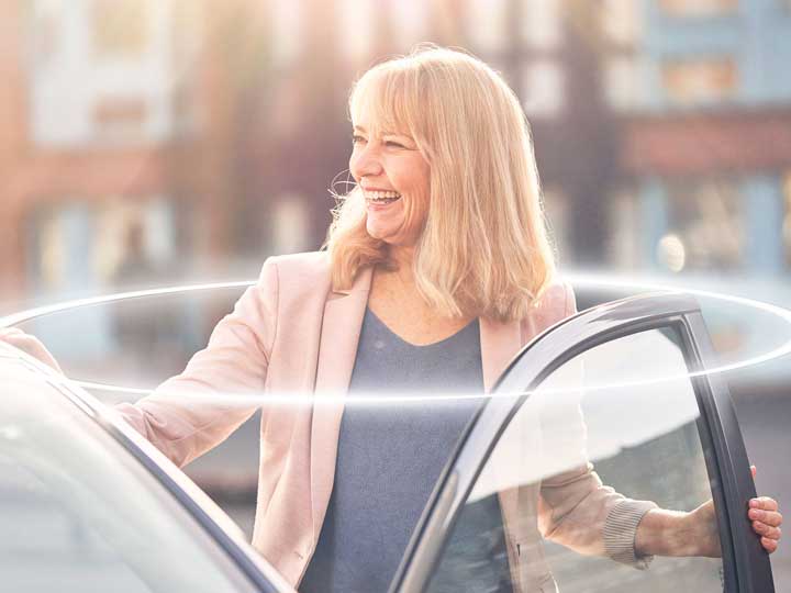 Woman entering car